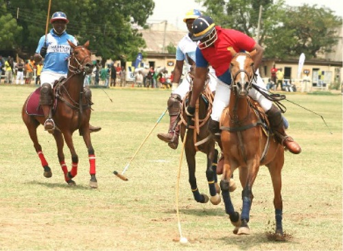 Chairman of Kano Polo Club Bashir Dantata breaks away from his marker at a recent Kano international polo tournament.