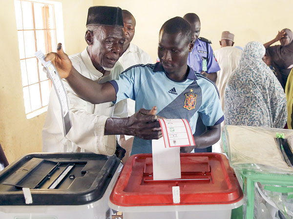 Nigerian voters casting their votes during an election