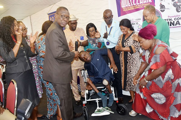 Pic 14 Rotary Club of Abuja Maitama presents Electric Chair to Polio Survivor in Abuja